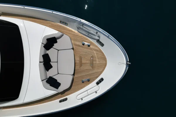 Top-down aerial view of the bow lounge and foredeck sunbathing area on the Sanlorenzo 96 in Porto Cervo.