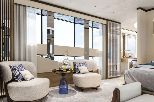 Elegant private seating area within the master suite of the Bilgin 163 superyacht, featuring luxury armchairs and floor-to-ceiling windows.