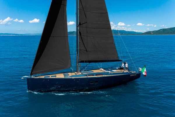 Hanse 575 sailing yacht with sails up in Porto Cervo, Costa Smeralda, Sardinia