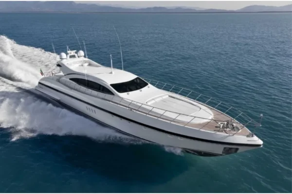 Mangusta 108 luxury yacht cruising on clear blue waters near Porto Cervo, Costa Smeralda, Sardinia