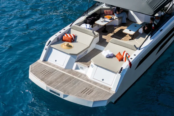 High angle view of the stern deck and teak swim platform of the BB Yachts Panarea 44 in the sea near Porto Cervo, Costa Smeralda, Sardinia.